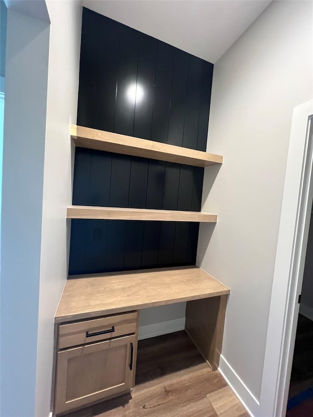 203 Hudson Ave, Van Meter, IA 50261 - detailed view of wood finished floors and baseboards