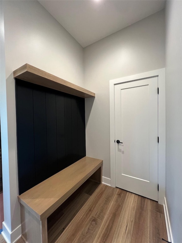 203 Hudson Ave, Van Meter, IA 50261 - mudroom with wood finished floors and baseboards