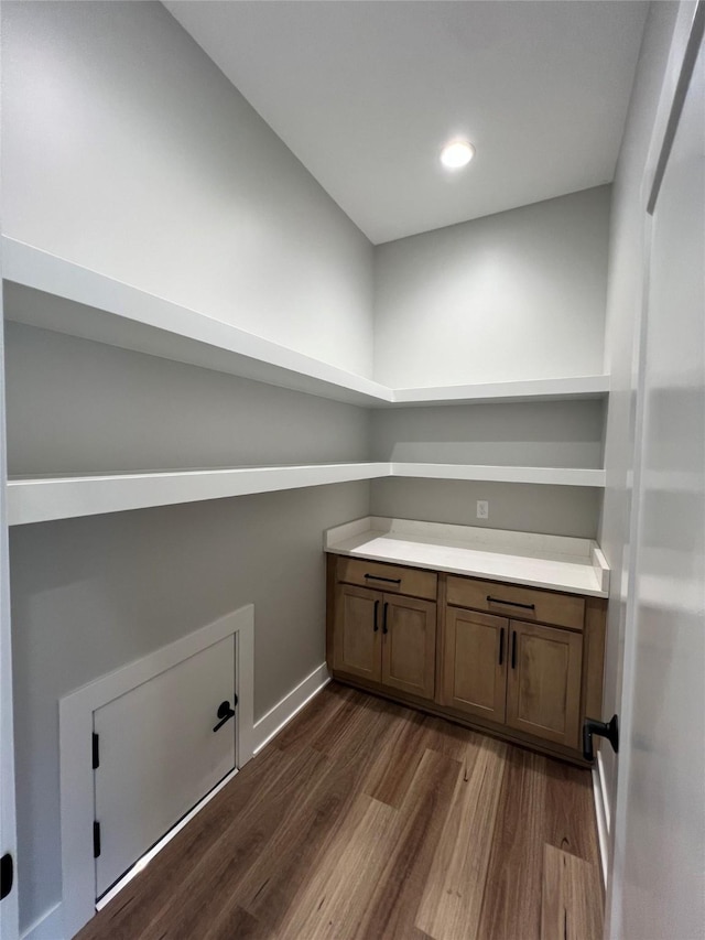 203 Hudson Ave, Van Meter, IA 50261 - laundry area featuring dark wood-type flooring, baseboards, and recessed lighting