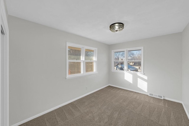 view of carpeted spare room