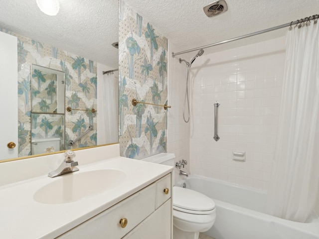 full bathroom with shower / bath combination with curtain, toilet, a textured ceiling, and vanity