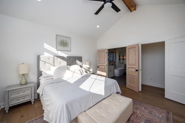 bedroom featuring ensuite bath, ceiling fan, beamed ceiling, and dark hardwood / wood-style floors