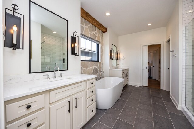 bathroom featuring tile patterned floors, vanity, and plus walk in shower