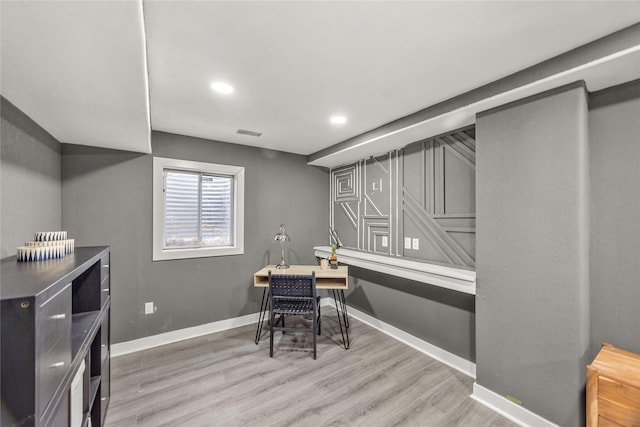 office area with wood-type flooring