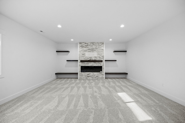 unfurnished living room with light carpet