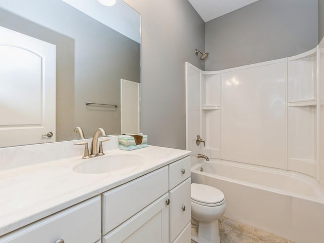 full bathroom with tile patterned floors, vanity, toilet, and shower / bathtub combination