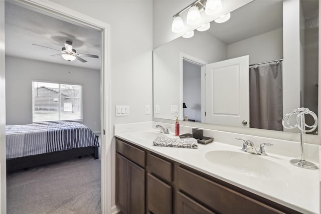 bathroom featuring ceiling fan and vanity