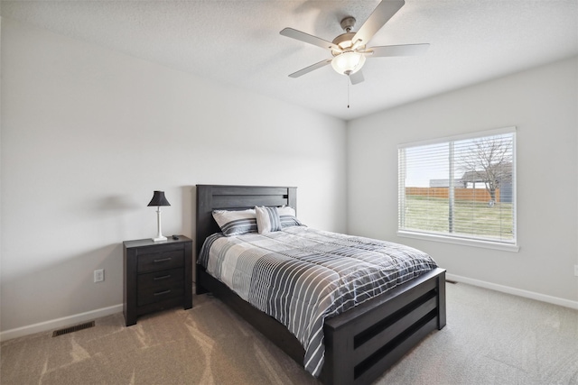 bedroom featuring carpet flooring and ceiling fan