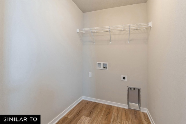 laundry room featuring electric dryer hookup, washer hookup, and wood-type flooring