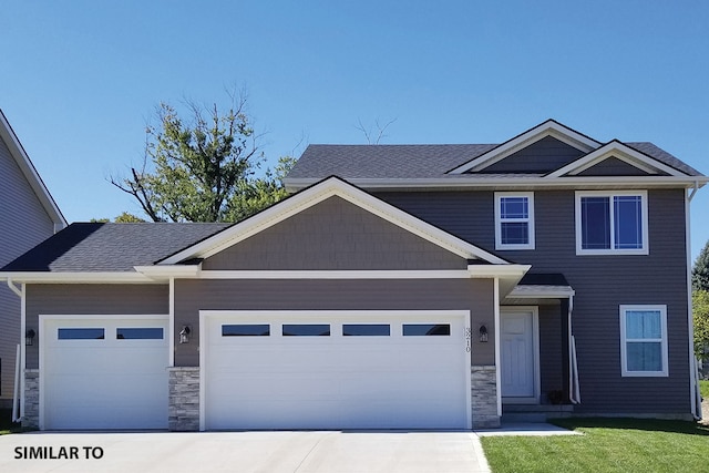 view of front of home with a garage