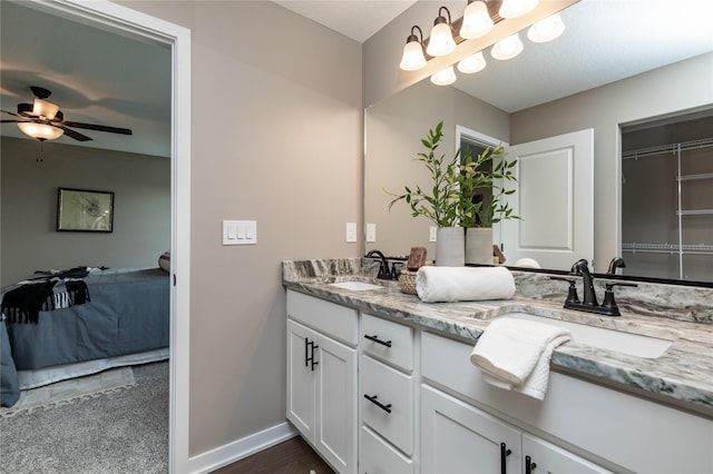 bathroom with vanity and ceiling fan