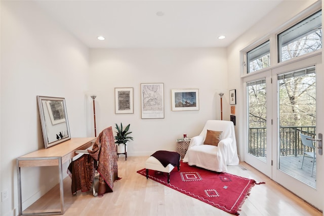 home office with light wood-style floors, baseboards, and recessed lighting