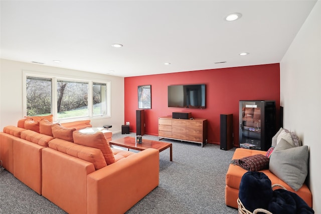 living area with recessed lighting, carpet flooring, visible vents, and baseboards