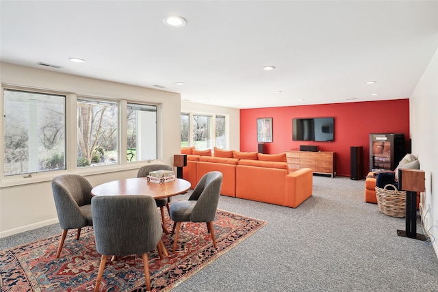 carpeted dining space with baseboards, visible vents, and recessed lighting