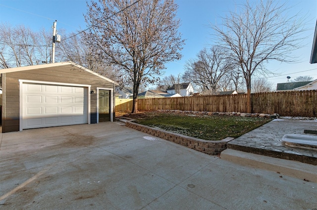 garage with a lawn