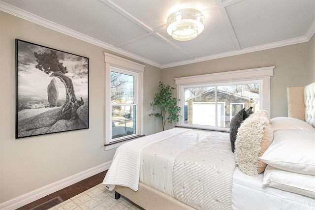 bedroom with wood-type flooring and crown molding