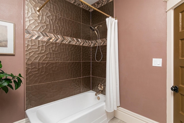 bathroom featuring shower / bath combination with curtain