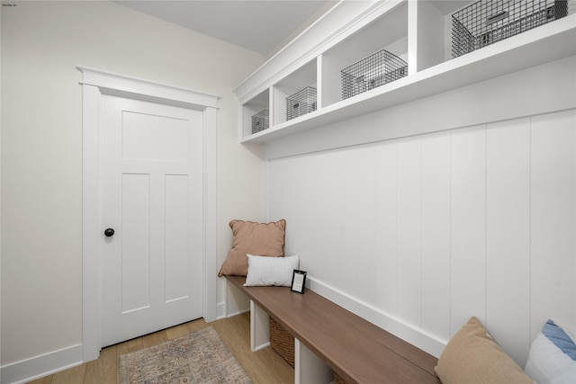 mudroom with light hardwood / wood-style floors