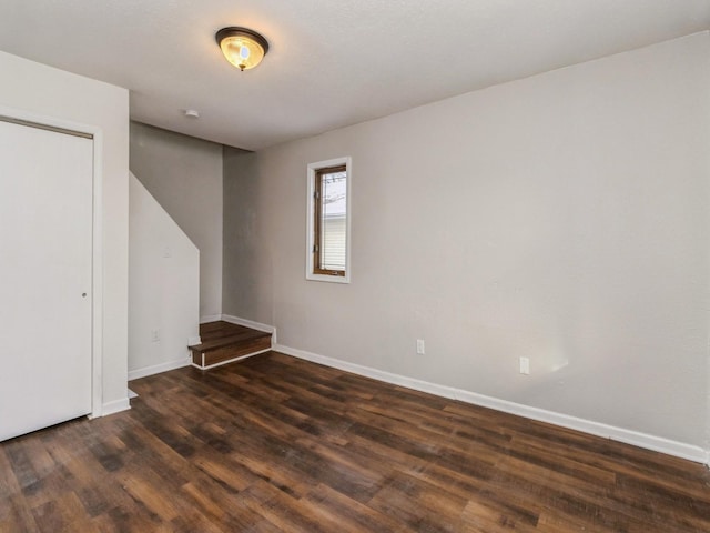 interior space with dark hardwood / wood-style flooring