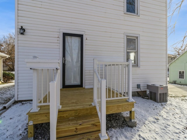 entrance to property featuring central AC