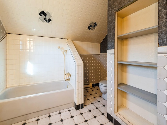 bathroom featuring toilet, tile walls, and independent shower and bath