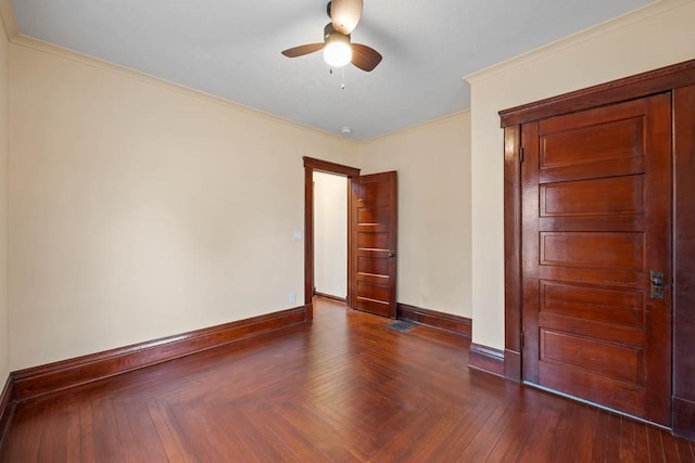 unfurnished bedroom with crown molding, ceiling fan, and dark parquet floors