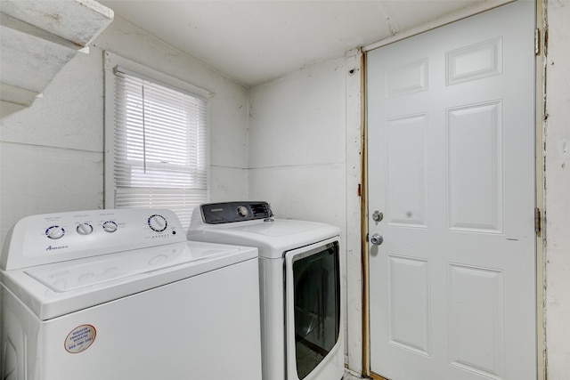 washroom featuring washing machine and dryer