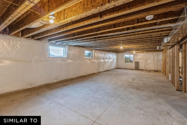 basement featuring plenty of natural light