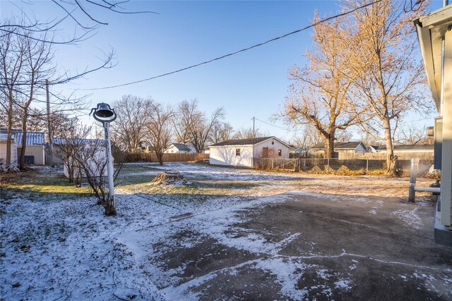 view of yard covered in snow