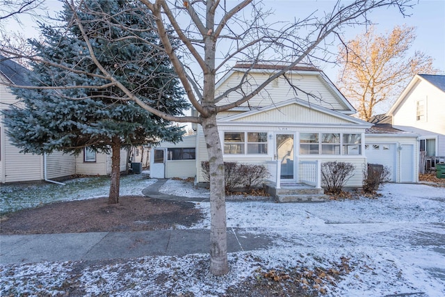 view of front of house with a sunroom