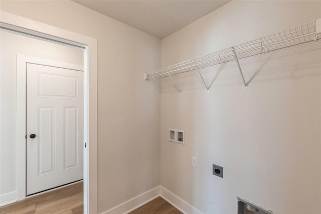 washroom featuring laundry area, washer hookup, hookup for an electric dryer, and wood finished floors