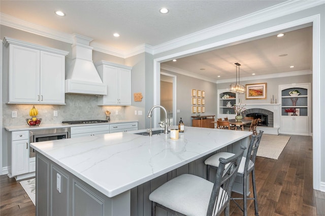 kitchen featuring dark hardwood / wood-style floors and a spacious island