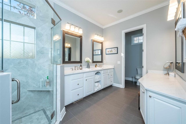 bathroom with walk in shower, vanity, ornamental molding, and toilet