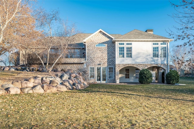 view of front of home with a front yard