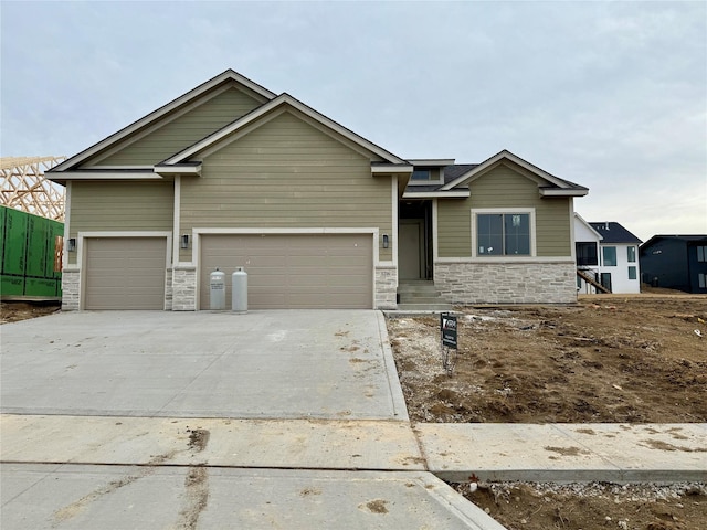 craftsman inspired home featuring a garage