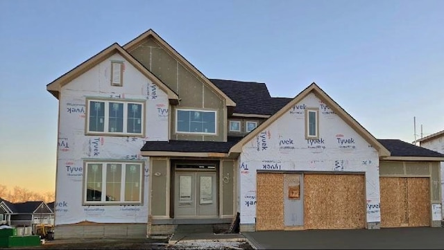 property under construction featuring french doors