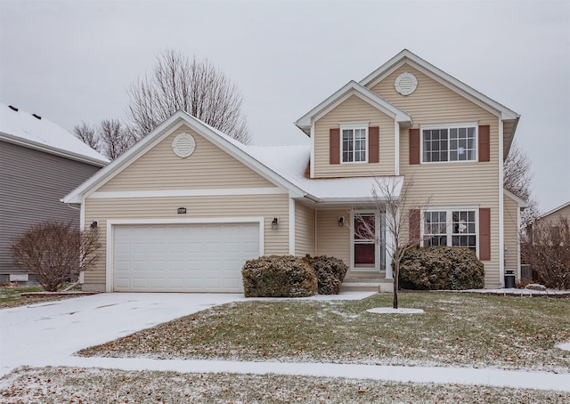 front of property with a garage