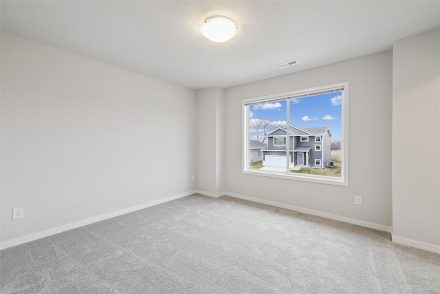 1745 Willow Ct, Norwalk, IA 50211 - carpeted empty room with baseboards