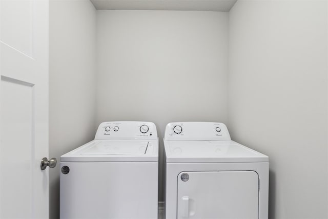 1727 Willow Ct, Norwalk, IA 50211 - laundry room featuring washing machine and clothes dryer