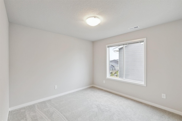 1727 Willow Ct, Norwalk, IA 50211 - empty room with carpet and a textured ceiling