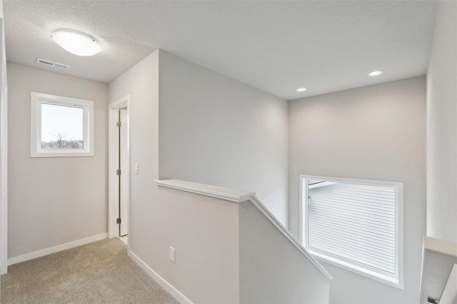 1727 Willow Ct, Norwalk, IA 50211 - hallway featuring an upstairs landing, carpet, and recessed lighting