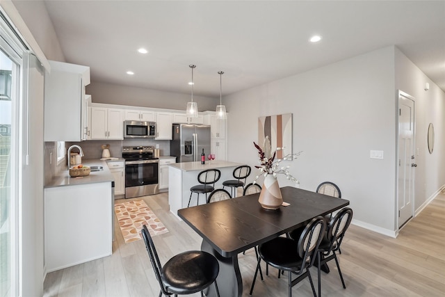 1727 Willow Ct, Norwalk, IA 50211 - dining room with light wood finished floors and recessed lighting