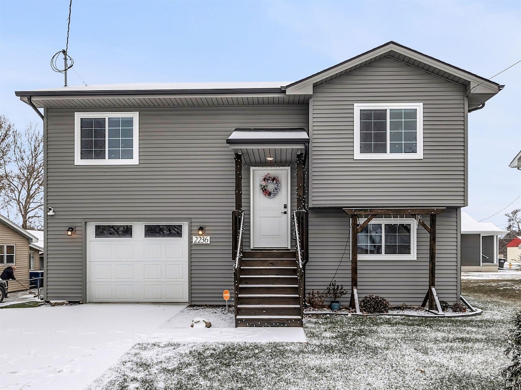 bi-level home featuring a garage