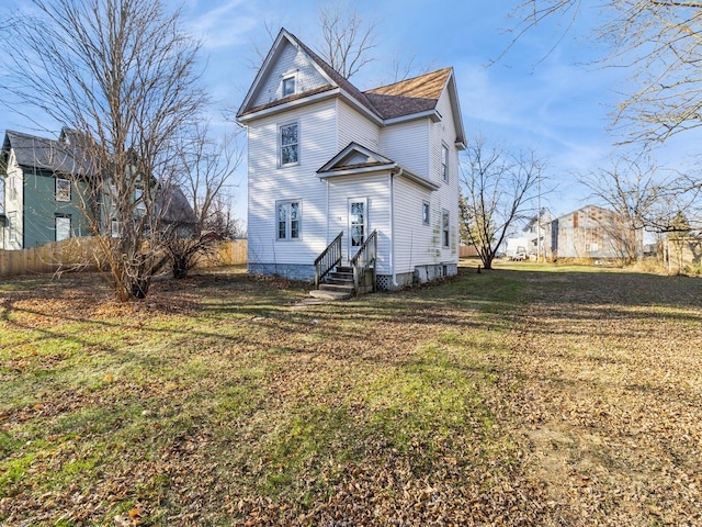 victorian house with a front yard