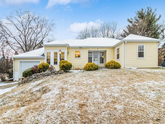 view of front of home with a garage