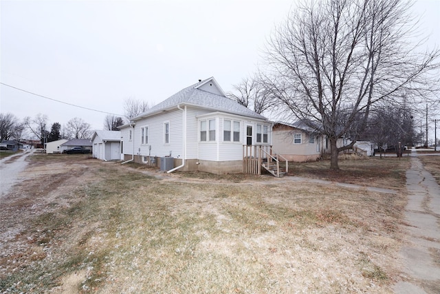 view of home's exterior with central AC unit