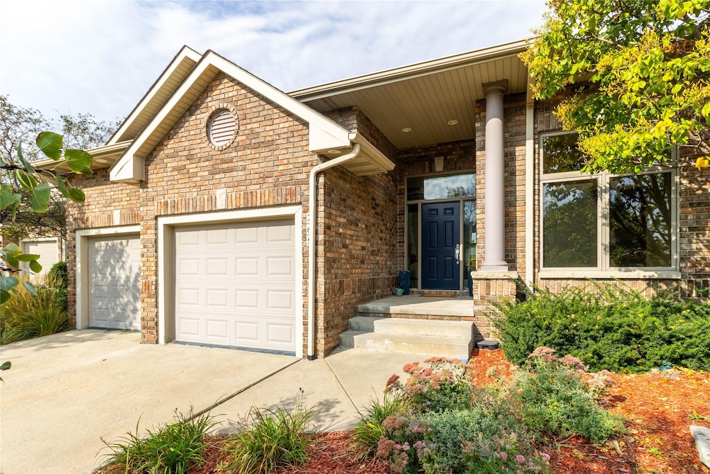 front of property with a garage