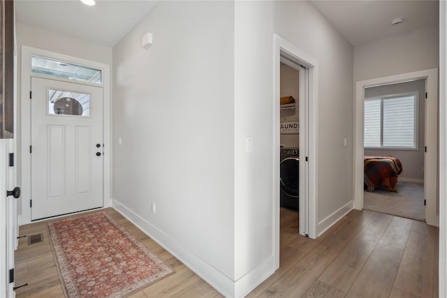 foyer featuring light wood-type flooring