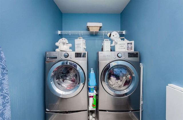 laundry area featuring washer and clothes dryer