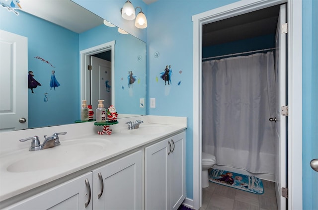 full bathroom featuring vanity, toilet, and shower / bath combo with shower curtain